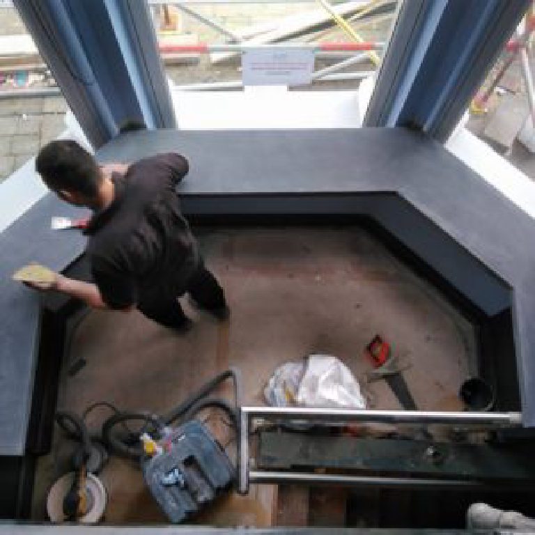 Sanding back the MicroCement window seating