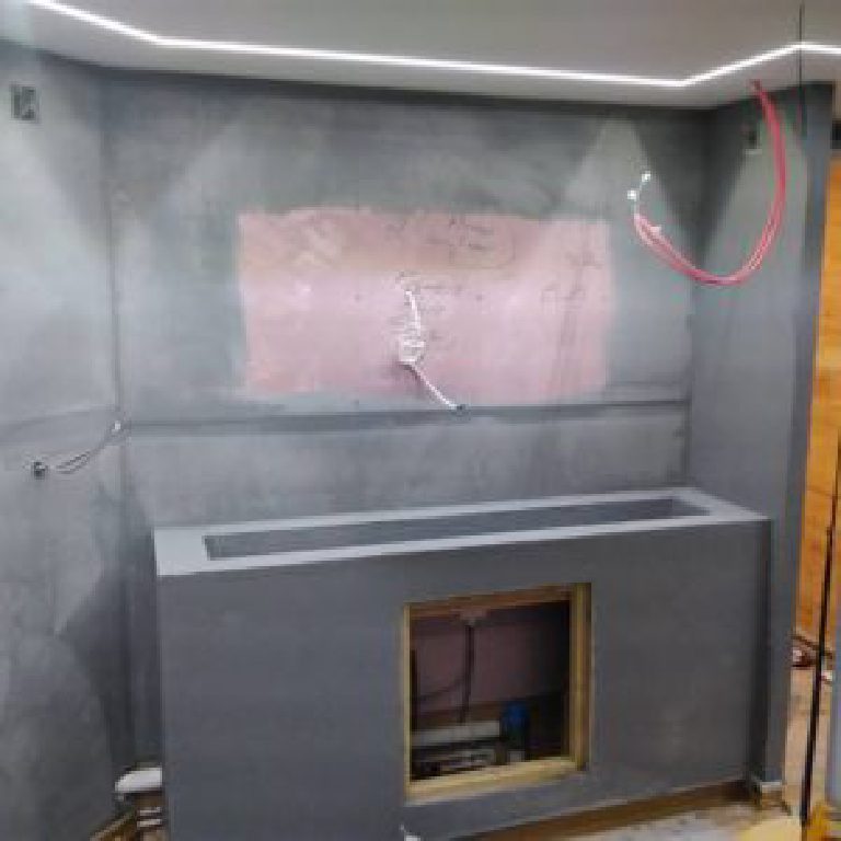 The fire wall based out in grey, wires still exposed