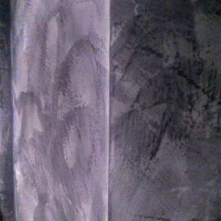 Close-up of the black Marmorino texture