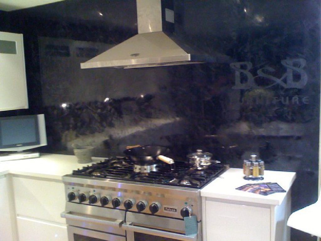 Black Lucidato Venetian Plaster with stencilled logo