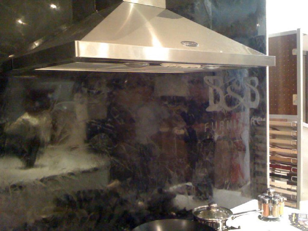 Black Lucidato Venetian Plaster with stencilled logo