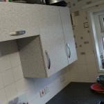 The wall units transformed, same doors, same handles