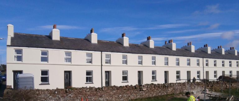 Showing application of lime render and mineral paint