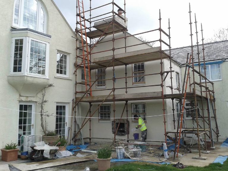 Application of Lime thin coat render