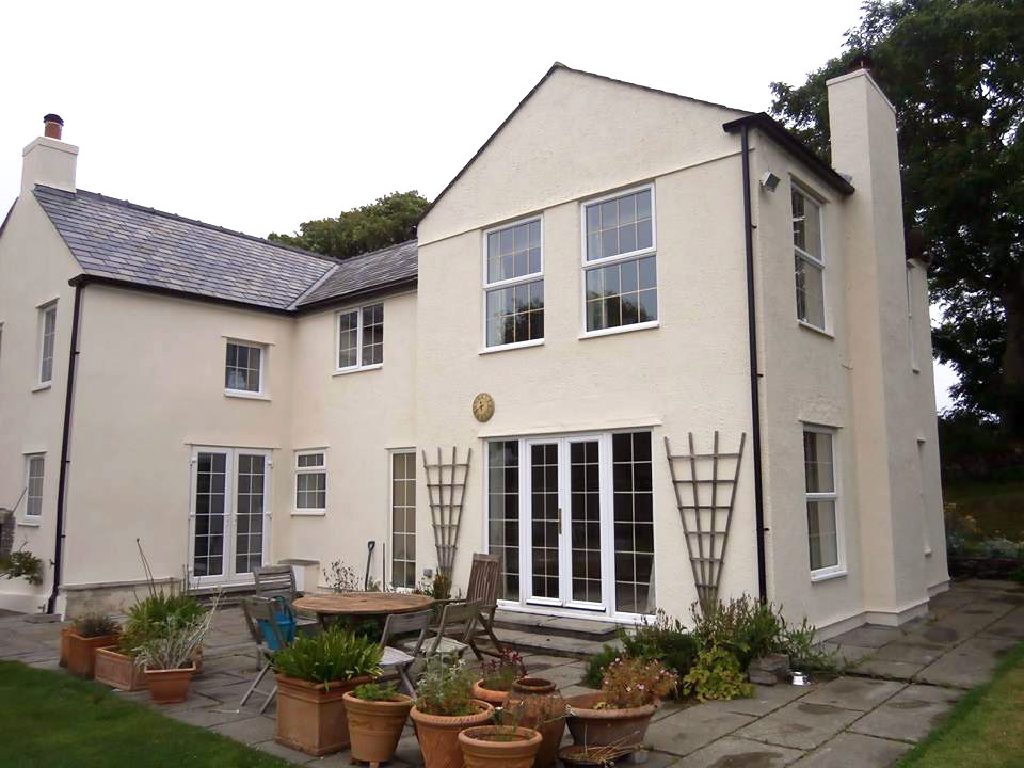The garden elevation in fresh cream lime thin coat render