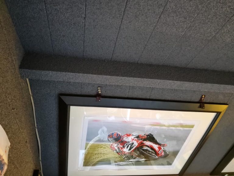 The cork sprayed over the beam above the door as well as the wall around it