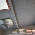 The sprayed cork ceiling following the pitch of the shed roof