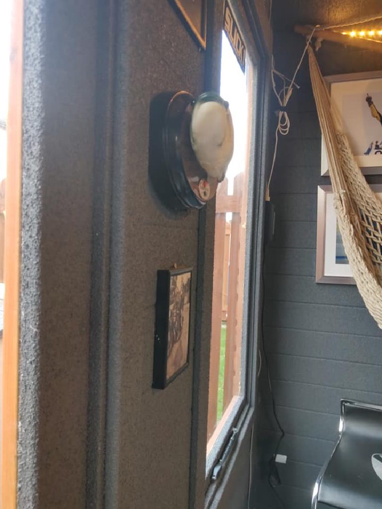 The cork carried around the window reveal and over the frame itself