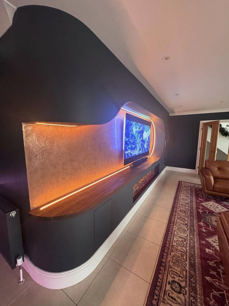 The plaster panel along its length, LED strip washing the surface