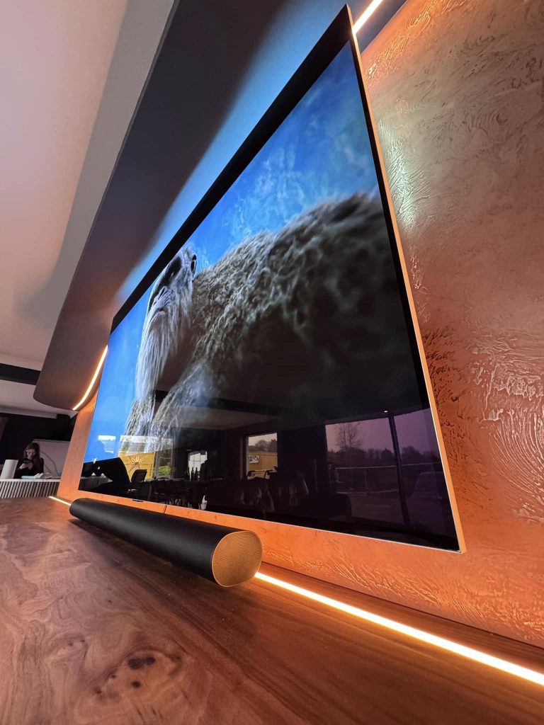 Close view of the Venetian plaster running right up to the edge of the screen