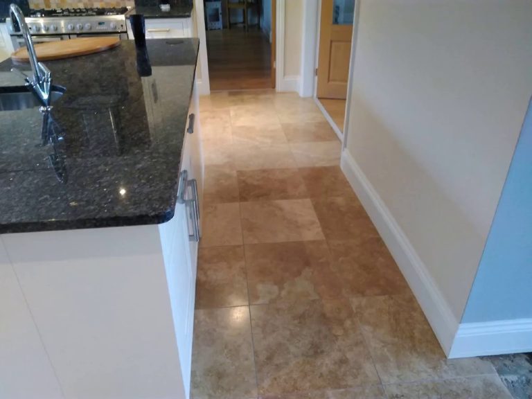 The original beige tiled floor before the makeover