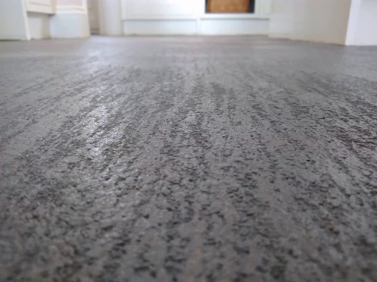 The Travertine texture being drawn through the wet coat