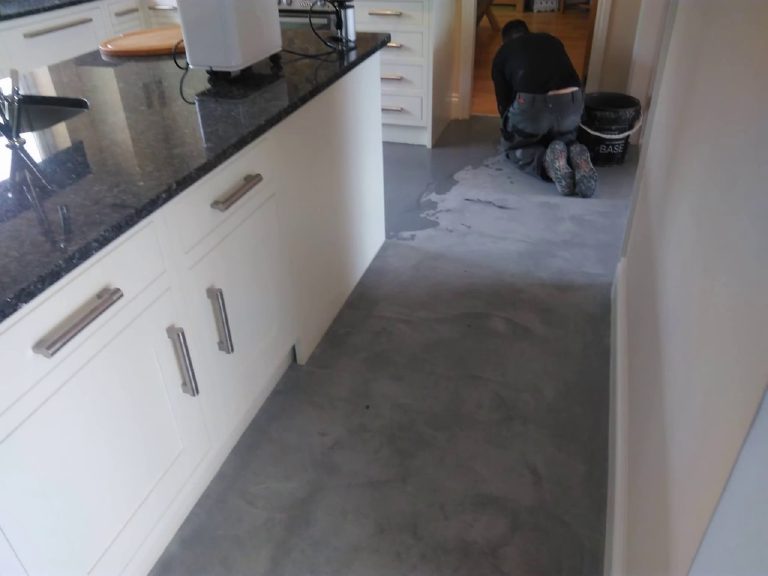 Working the floor coat by coat beside the units