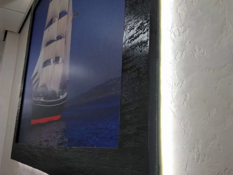 Backlit tall ship print in a black MicroCement frame