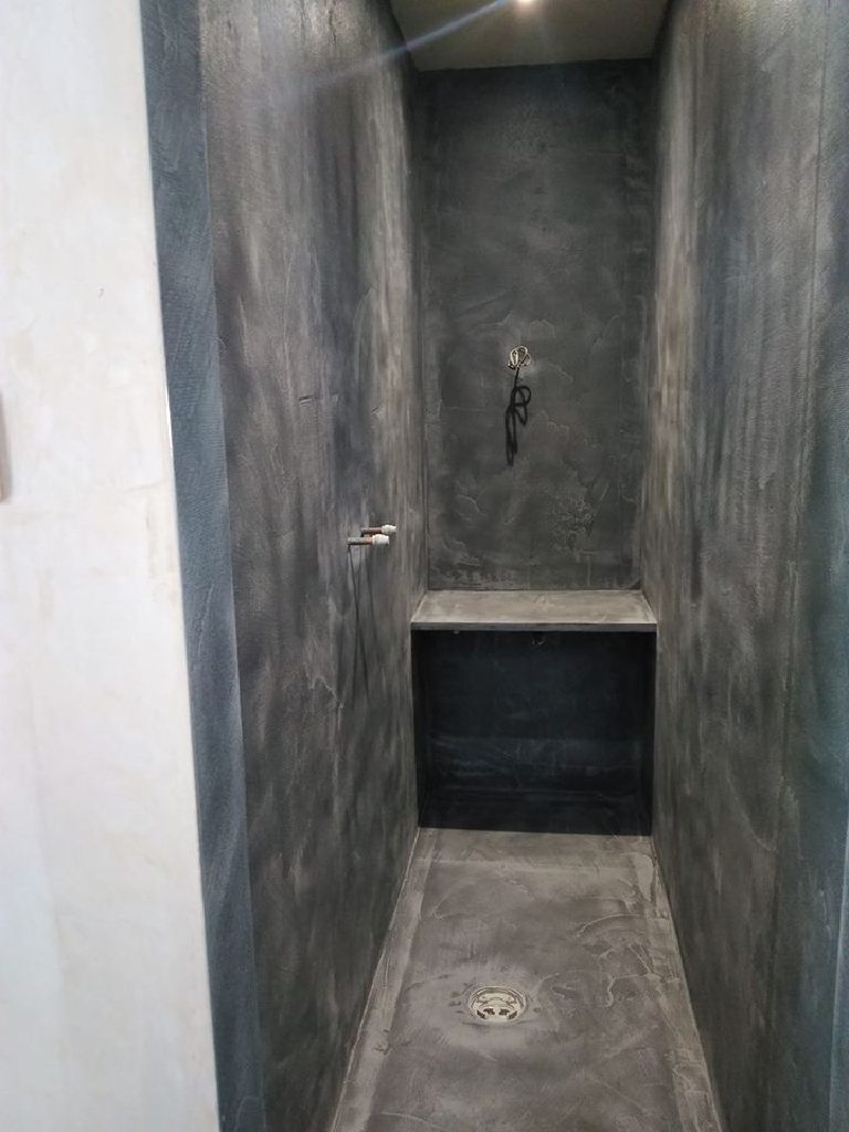 The wet room with the first base coat of MicroCement on, sanded ready for the second