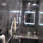 The finished wet room, seamless from floor to ceiling