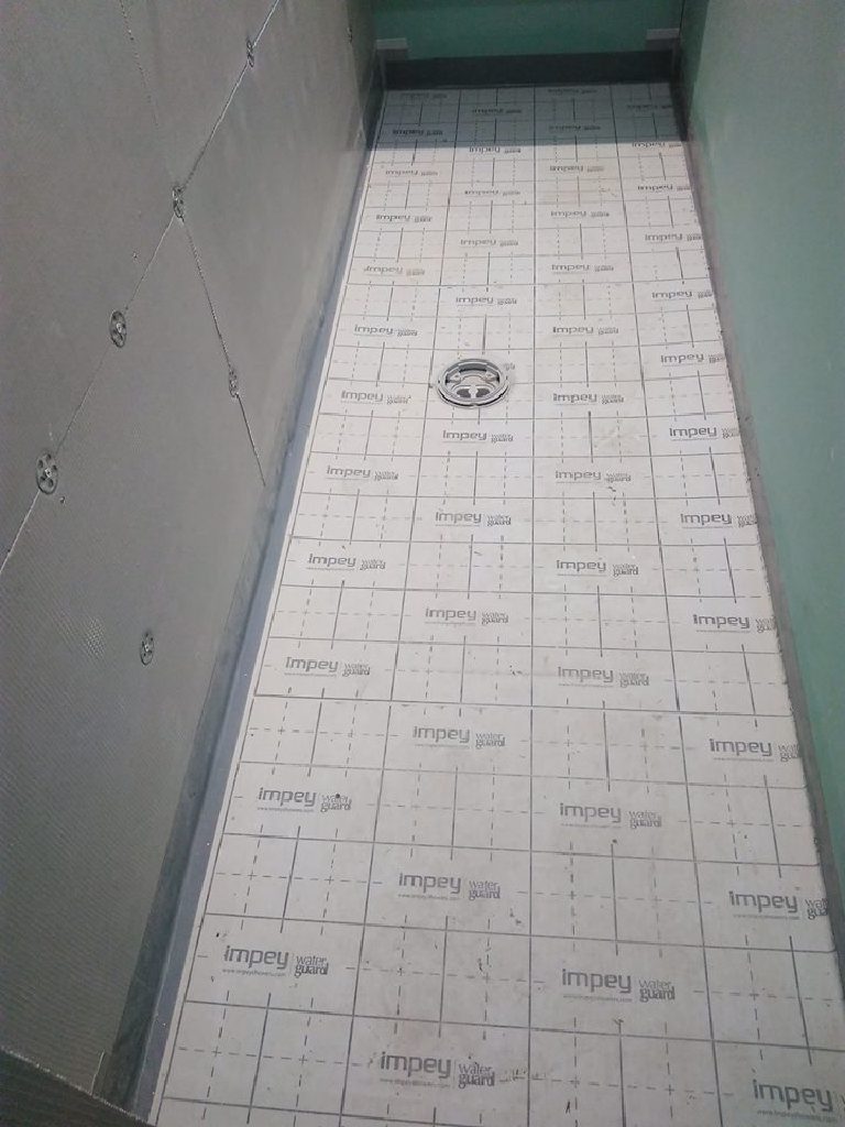Impey wet room floor former with the drain and fall built in