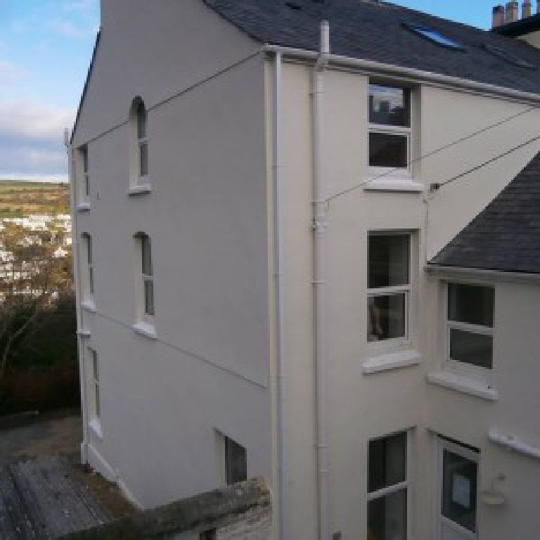 The gable elevation with its arched windows, looking out over Laxey