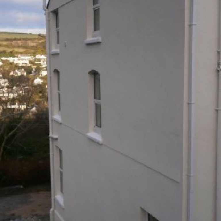 The gable elevation seen close in, Laxey and the hills beyond
