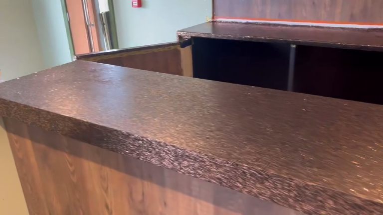 The front edge of the bar top with the finish carried over the edge onto the return