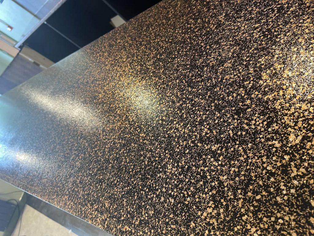 The flake up close on the bar top