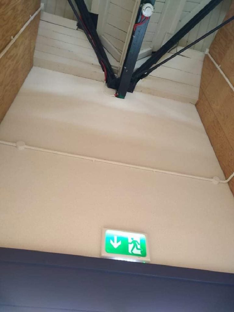 The finished ceiling above the exit sign