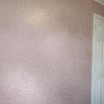 The pink glitter feature wall catching the light