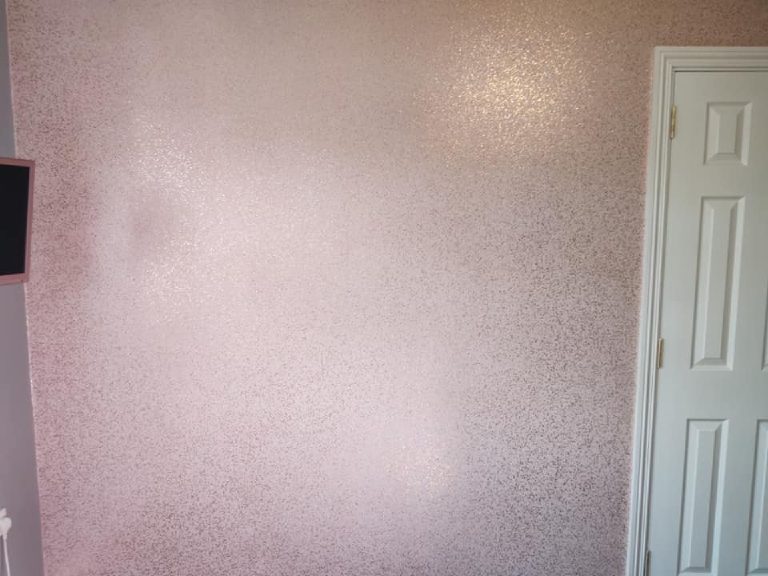 The pink glitter wall from the other side of the room