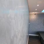 The soft grey Marmorino Classico wall running down the room