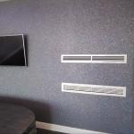 The Cassiopea back wall straight on, sparkling around the television