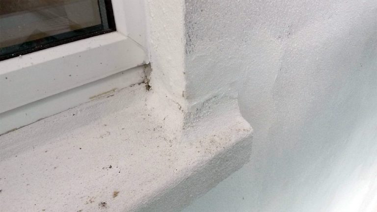 Before restoration – sill corner previously reshaped and painted over