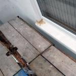New sandstone window sill cast and dressed in, wall freshly rendered