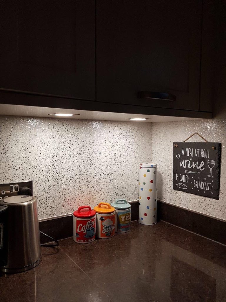 Jess's photo of the splash back sparkling under the cabinet lights
