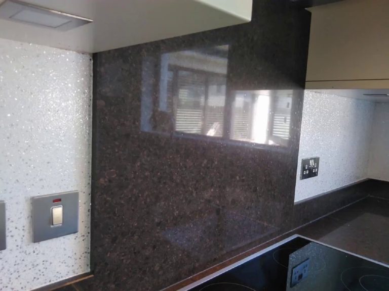 The splash back catching the window light beside the worktop