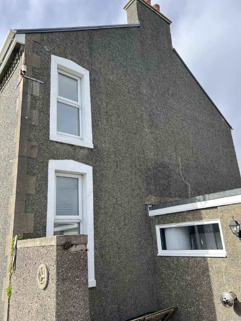 The old dash close to, with a hairline crack running down from the roofline