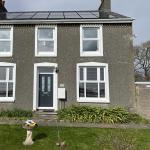 The same front elevation before, in the old grey dash