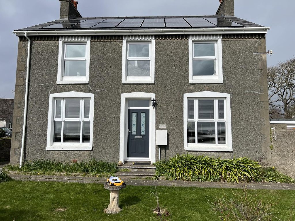 The same front elevation before, in the old grey dash